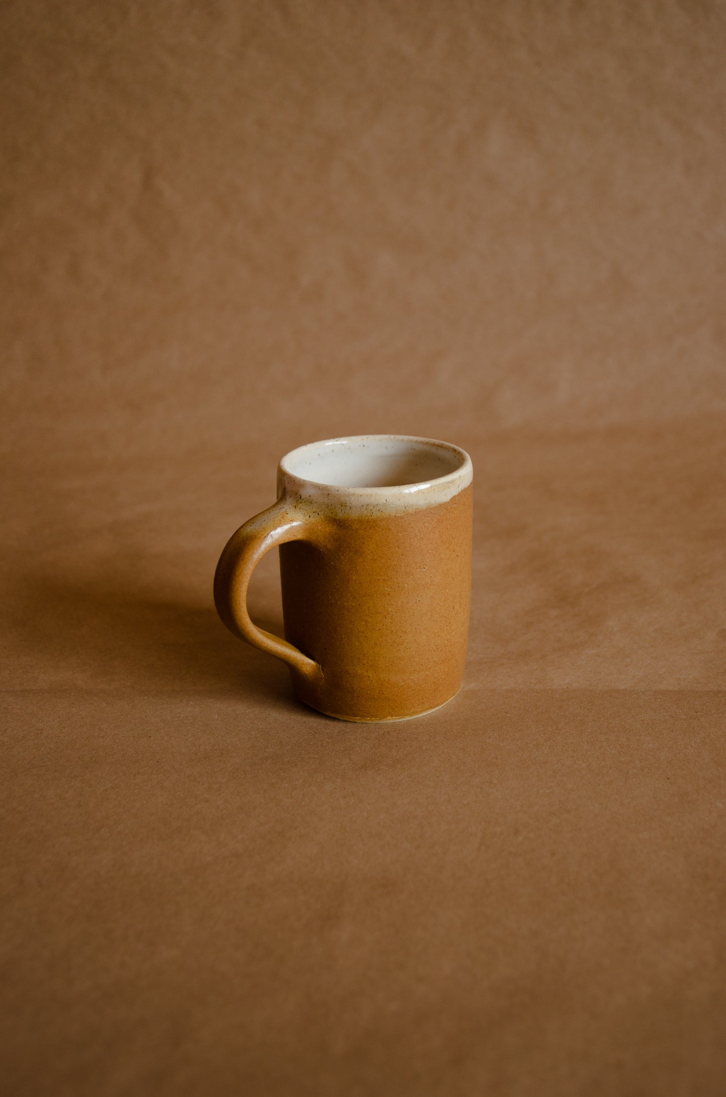 Taza individual mediana arena enfoque asa